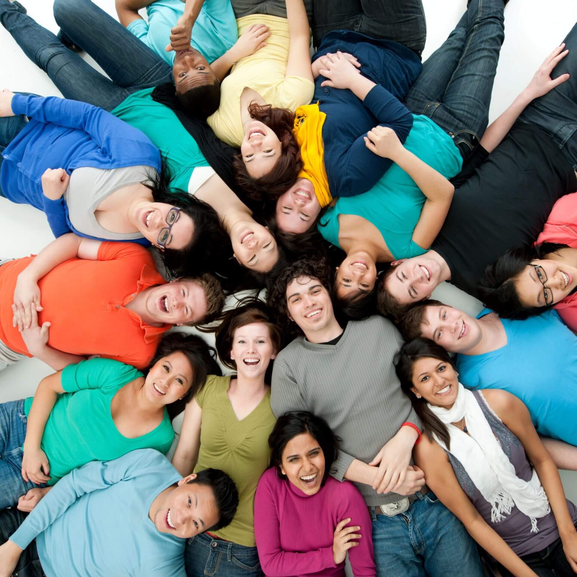 Diverse group lying in a circle